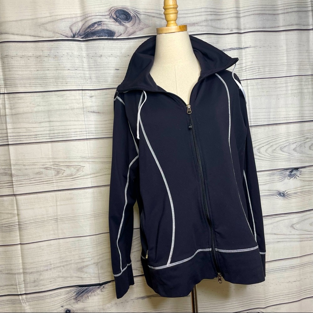 Black soft full zip jacket, white inverse stitching, pockets